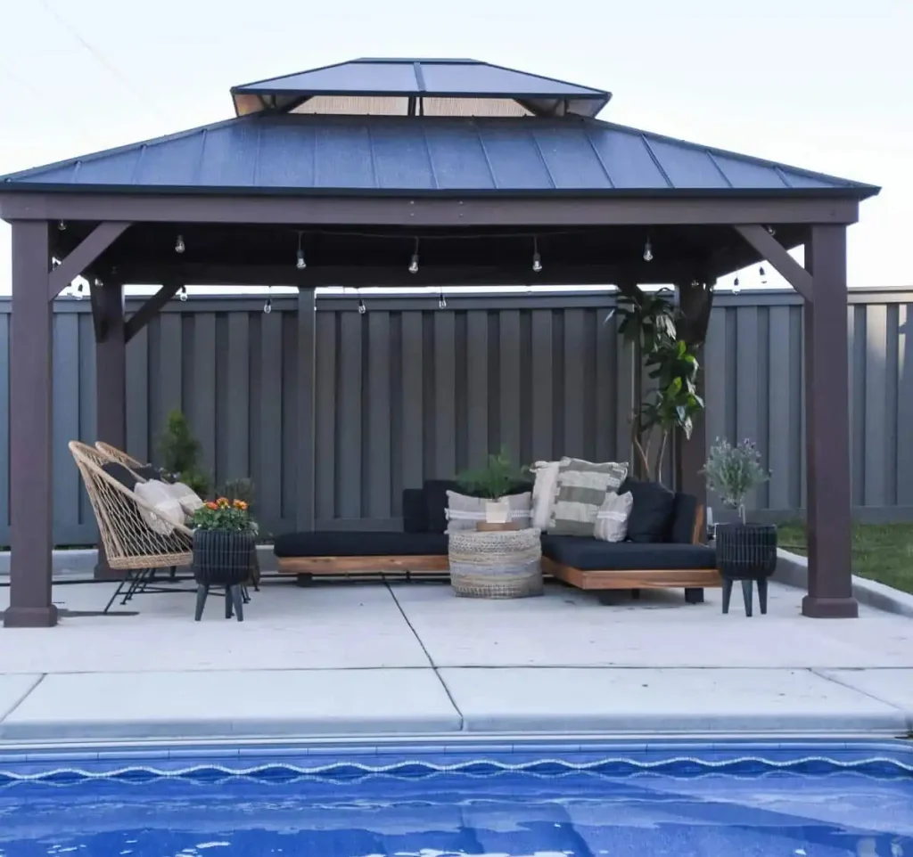 aluminum pergola beside pools