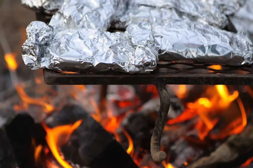 aluminum foil on the fire